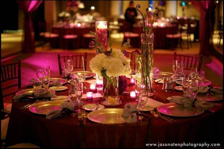 This stunning table scape against our spice crinkle taffeta linens offers a beautiful room pleasing appearance.  The reception was held at the University Club in East Lansing and the photographer Jason Aten captured this photo of our work for us.