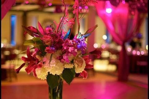 Crystals and Lighting can bring a room to life!!  This shot of our work at the University Club of East Lansing was captured by Jason Aten Photography.  We loved the Ferguson wedding it was flawless in execution and décor choices, our team worked for days on this wedding to complete the look of plum perfection.