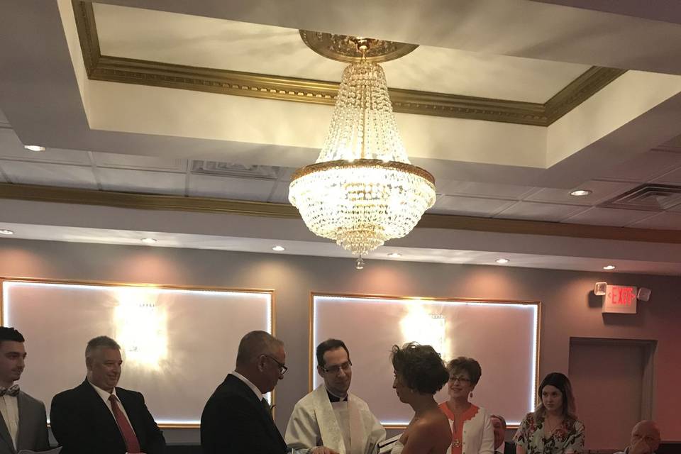 The wrapping of the newly married couples hands with the stole