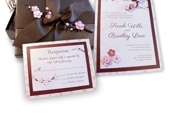 Custom Cherry Blossom Musical Wedding Invitation - This lovely invite features 3D cherry blossom embellishment, customized cherry blossom paper and the box has a ribbon with more Cherry Blossoms attached. Stunning and different, it is especially more so because when the box opens, music plays!