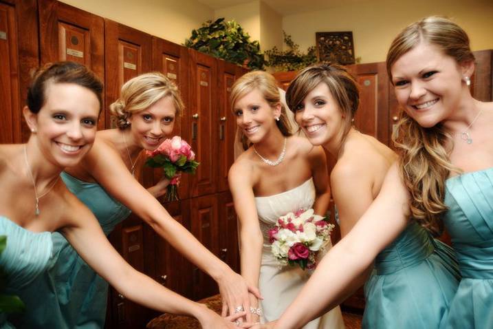 Group huddle with bridesmaids