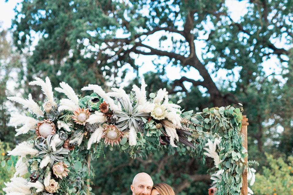 Bohemian pampas ceremony arch