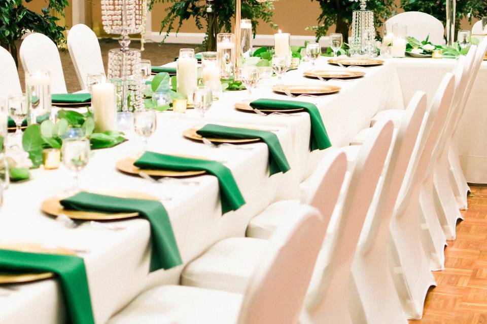 Long table setup with a touch of green