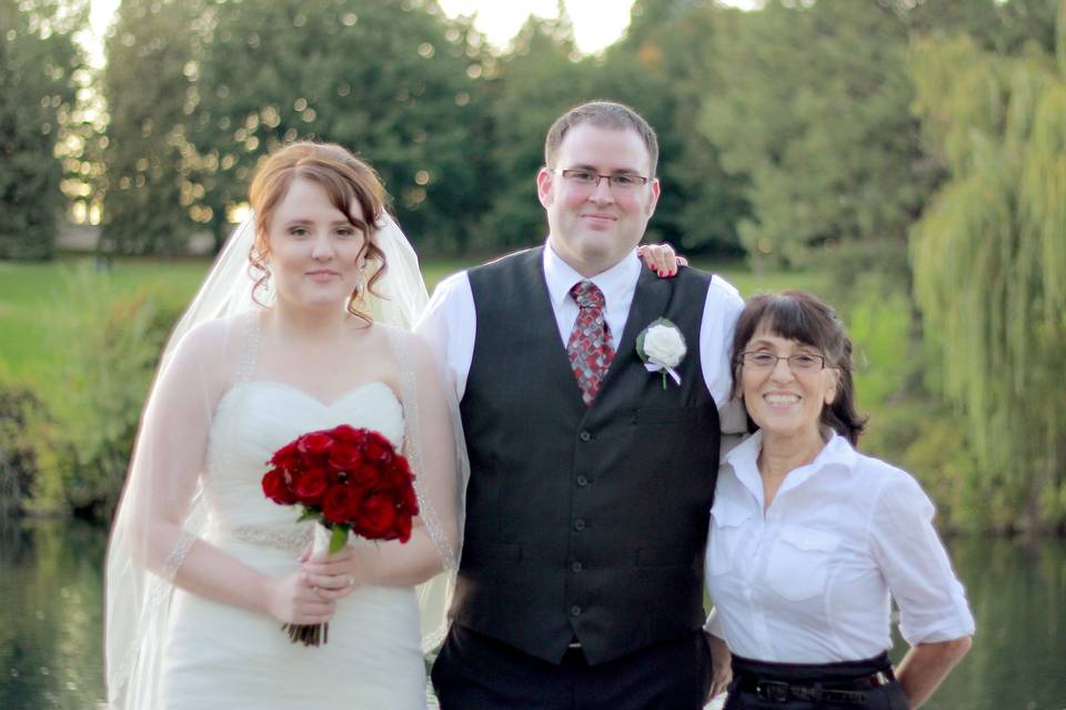 Officiant and the newlyweds