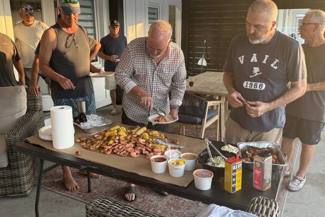 porch-boil-guys-serving-1.jpg