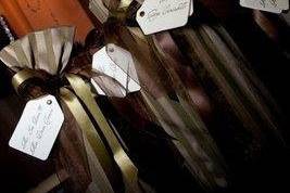 What better gift to give your guest than a bottle of wine to remember your special day. The wine bottles can not only be used as favors, but as personalized seating arrangements. Tags are placed on each bottle with your guest's names and the table where they will be having dinner. Your guest can even pop the cork and enjoy their gift with dinner!