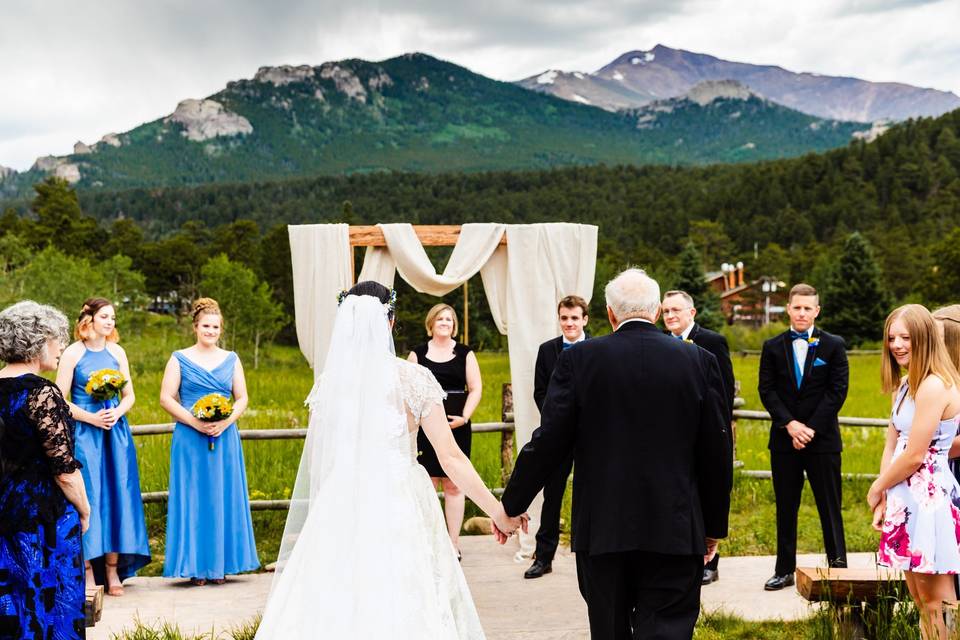 Bride walking towards groom