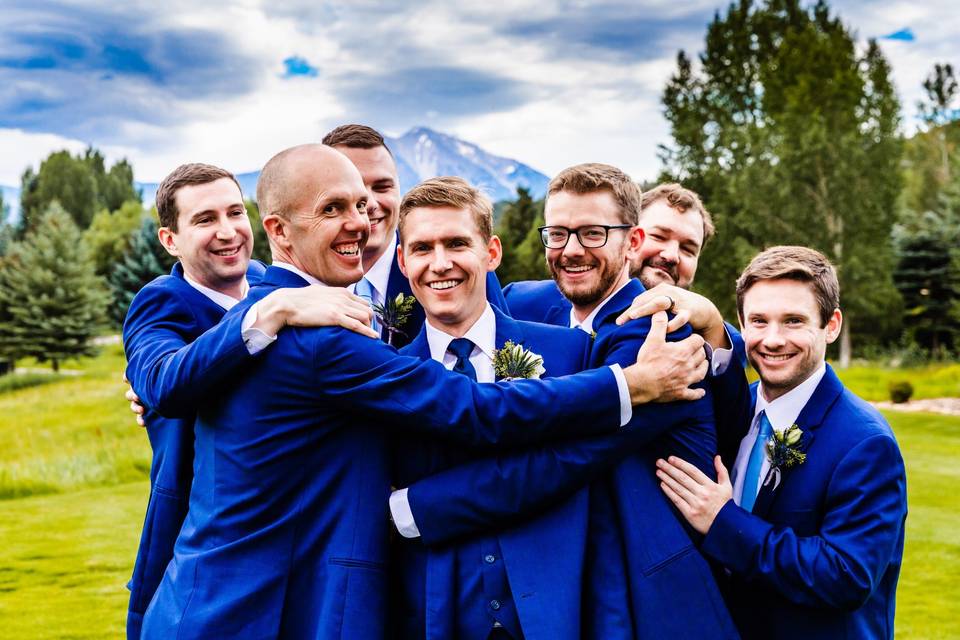 Group hug with groom