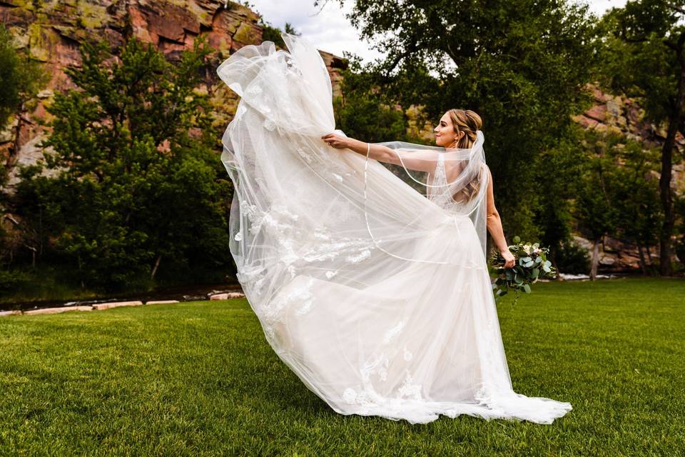 Bride tossing dress