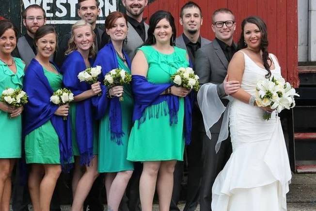 The couple with the bridesmaids and groomsmen