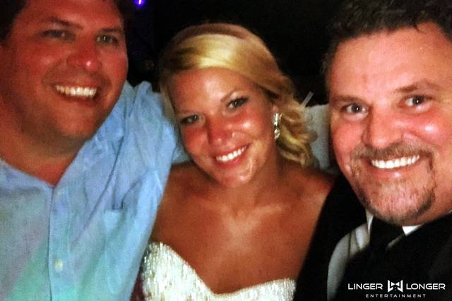 Couple with the wedding DJ