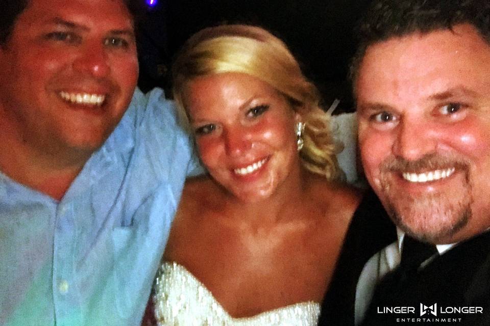 Couple with the wedding DJ