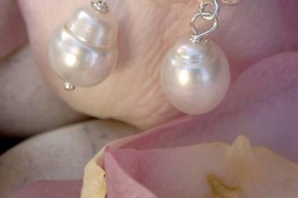 Peloponnese Earrings are as pretty as they are pink. A contemporary design with Pink sapphires on hand forged sterling silver ear wires.