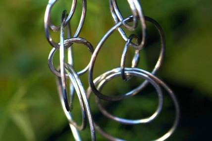 Olympia Earrings are white teardrop pearls with Sterling silver lever backs. The natural curvature of the pearls lend to a more natural design. The pearl and pearl shape can be changed to fit your personal design.