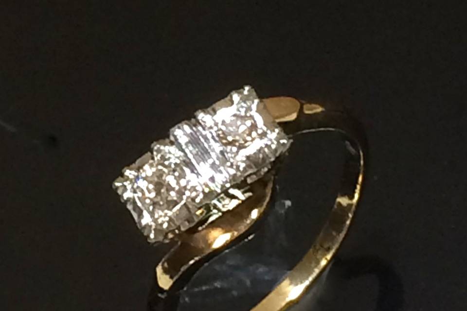 Antique two diamond engagement ring in 14kt gold total weight .25 cts