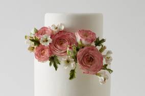 White cake with floral decorations