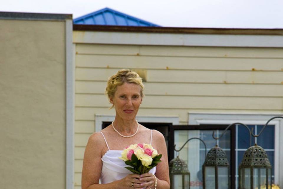 Bride walking down the dock