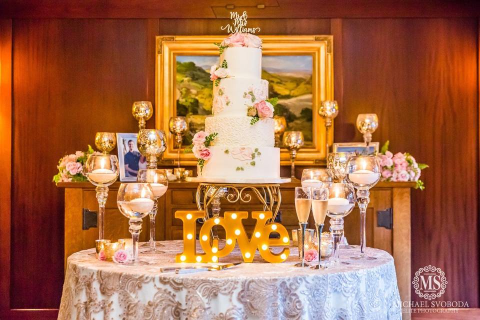 Elegant wedding cake with hand painted buttercream and flowers, at the lodge at torrey pines