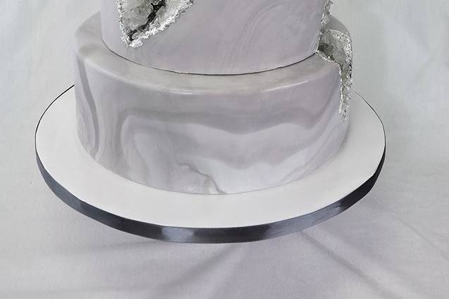 Awesome geode cake! Silver, charcoal, white with silver leaf