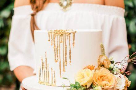 Gold drip double tall style single tier cake