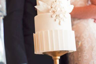 Rice paper feathers & sugar gems for a chic mid-century design wedding cake