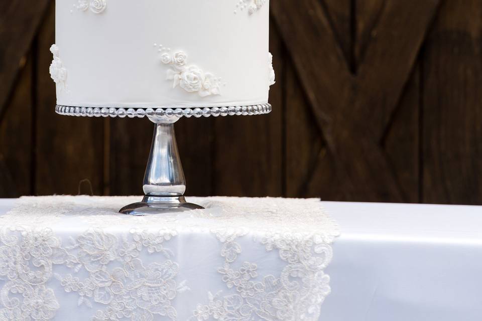 All white wedding cake, lace