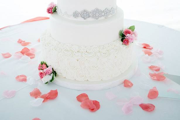 White wedding cake with minimal decor