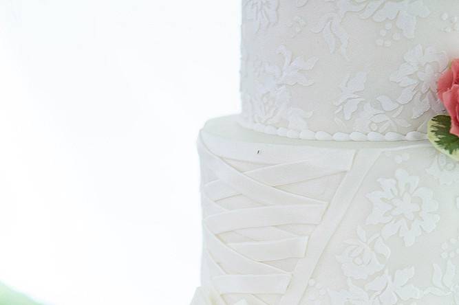 White wedding cake with a touch of silver