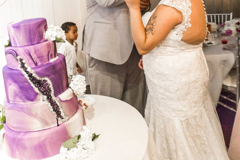 Enjoying the wedding cake