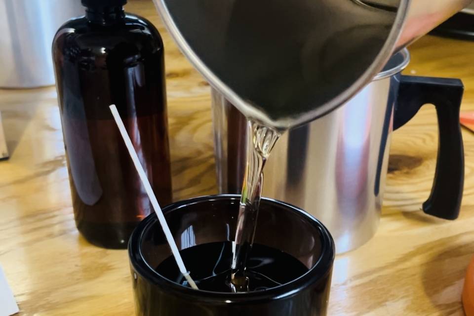 Pouring 10oz soy wax candles