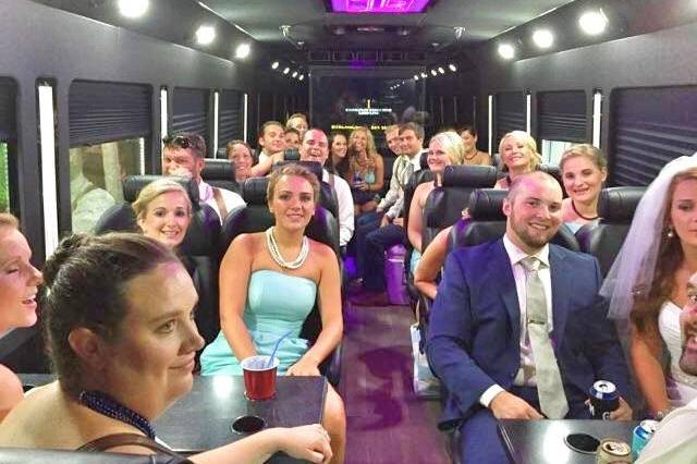 Full Wedding Party Of 25 In The Executive Limo Coach