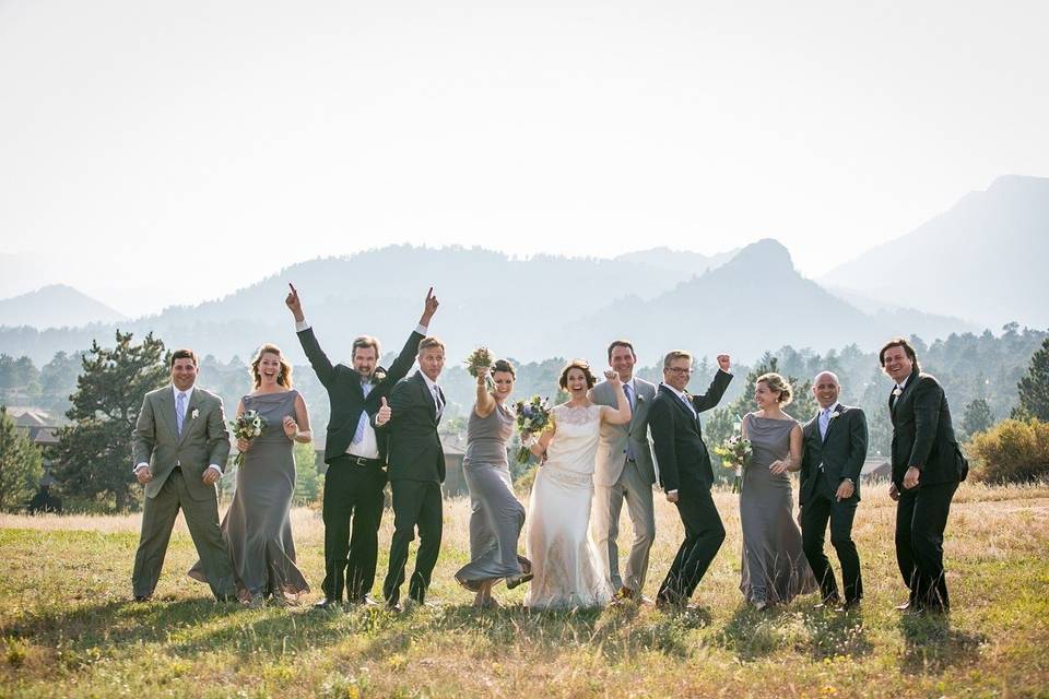 The couple with the bridesmaids and groomsmen