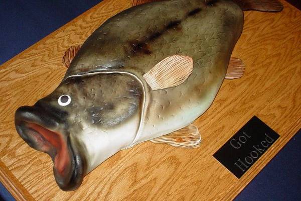 Grooms Cake: Big mouth bass covered in fondant over red velvet cake and air brushed colors.