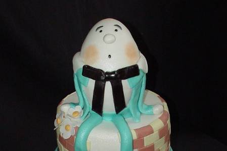 Humpty Dumpty Baby Shower: Fondant covered with nursery rhyme characters and flowers.