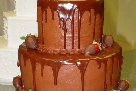 Grooms cake: Two tier chocolate on chocolate with chocolate covered strawberries.