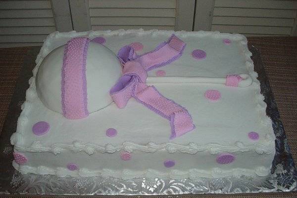 Baby rattle shower cake:  Buttercream with fondant ribbon and dots.