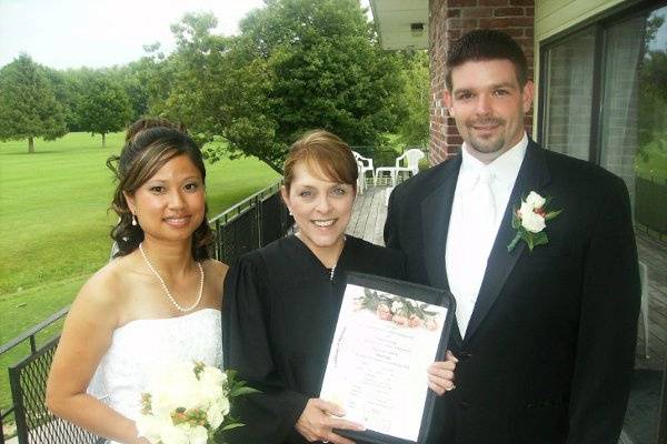 Officiant and the newlyweds