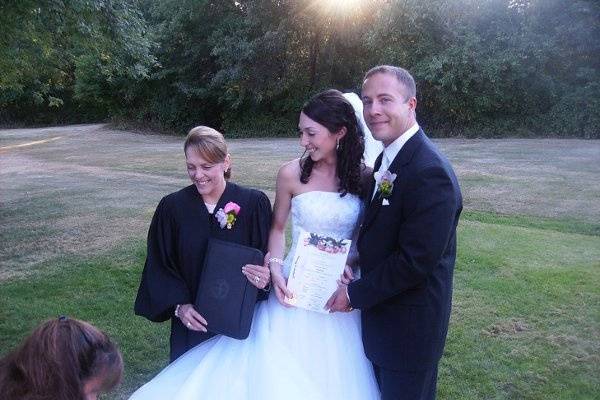 With the bride and groom