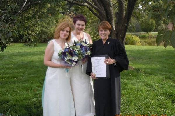 Brides with the officiant