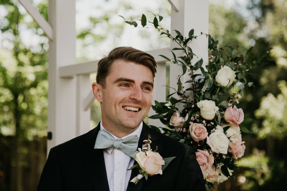 Groom tearing up at wedding