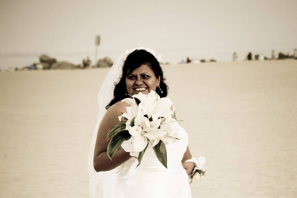 Running on the beach with a bride in Coronado island in Southern California