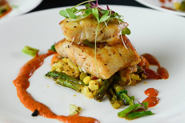 Pan Roasted Gulf Snappersummer grilled succotash of corn | asparagus | heirloom tomatoes | romesco sauce | grilled scallions