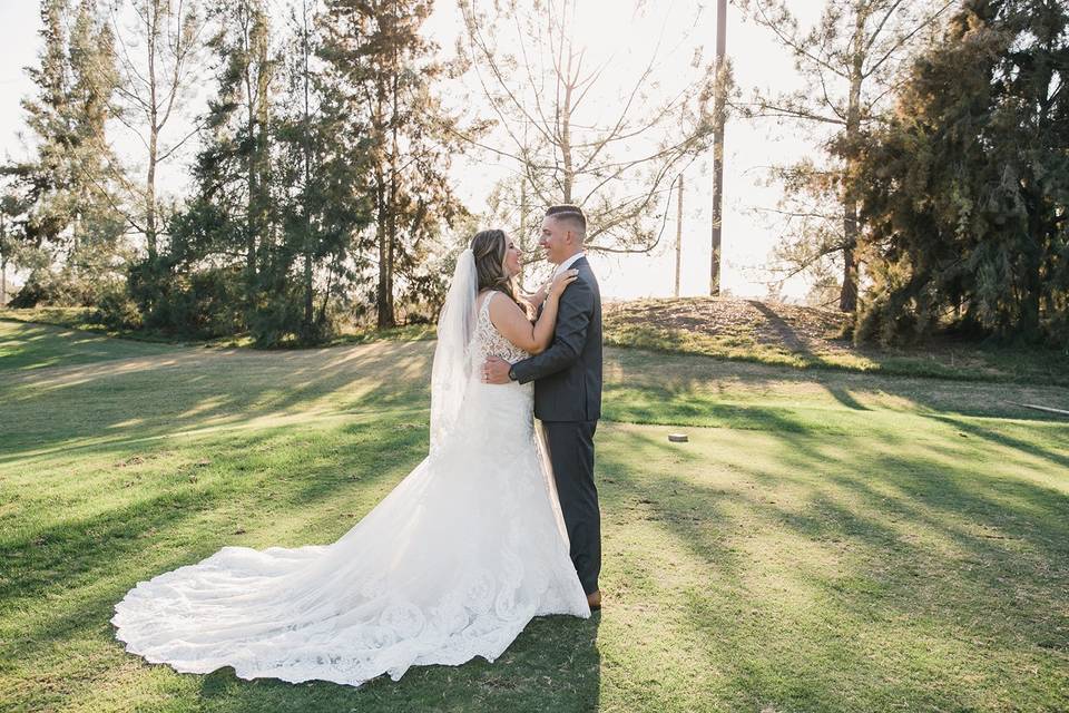 Bride and groom on the fairway