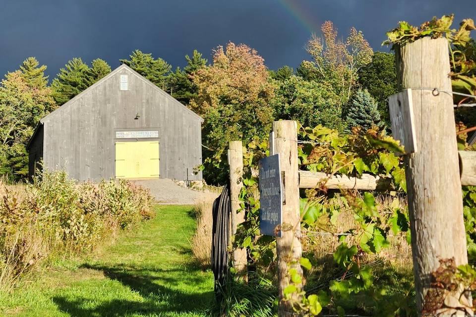 Rainbow over barn