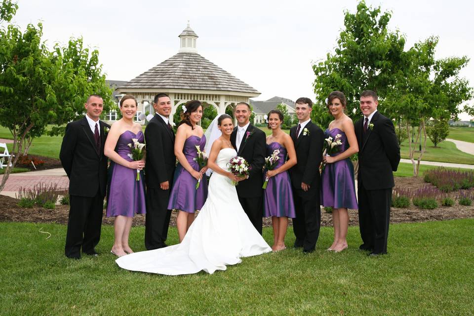 Newlyweds and their wedding party