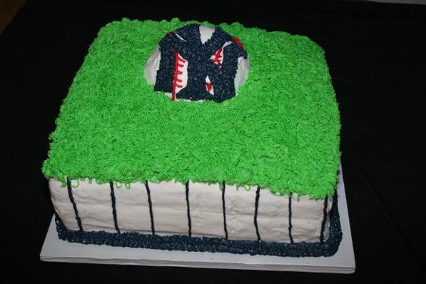 Grooms cake for a NY Yankees and canolli fan, canolli flavored cake and filling.