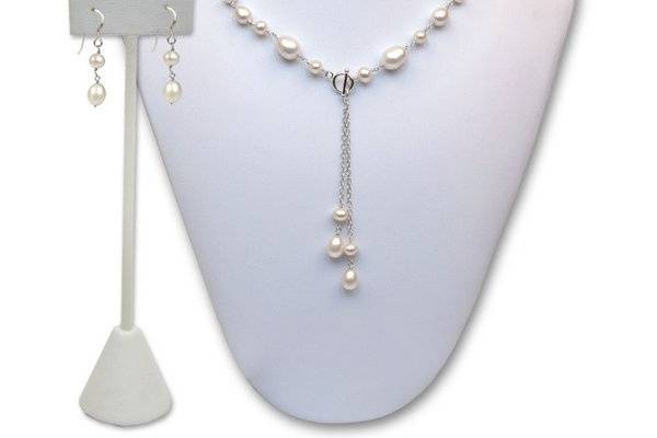 Taylor is a handmade cultured pearl necklace and earring set with teardrop pearls.