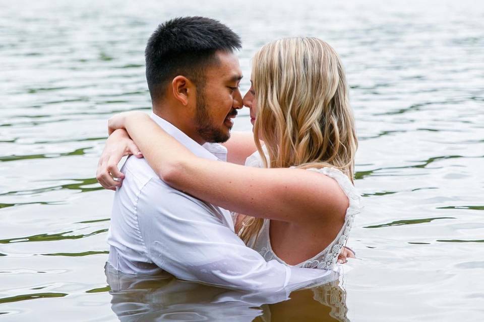 Couple's kiss by the lake