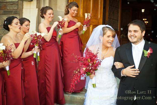 Leaving the chapel to the cheers of friends & family.
