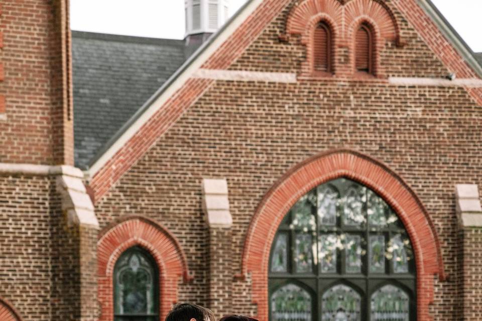 Bride and groom kiss